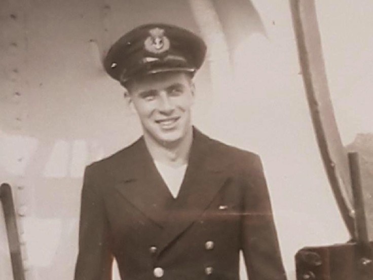 Todd's grandfather as a young man in uniform, smiling on the deck of a ship